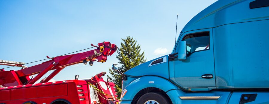 Tow truck with semi hooked up