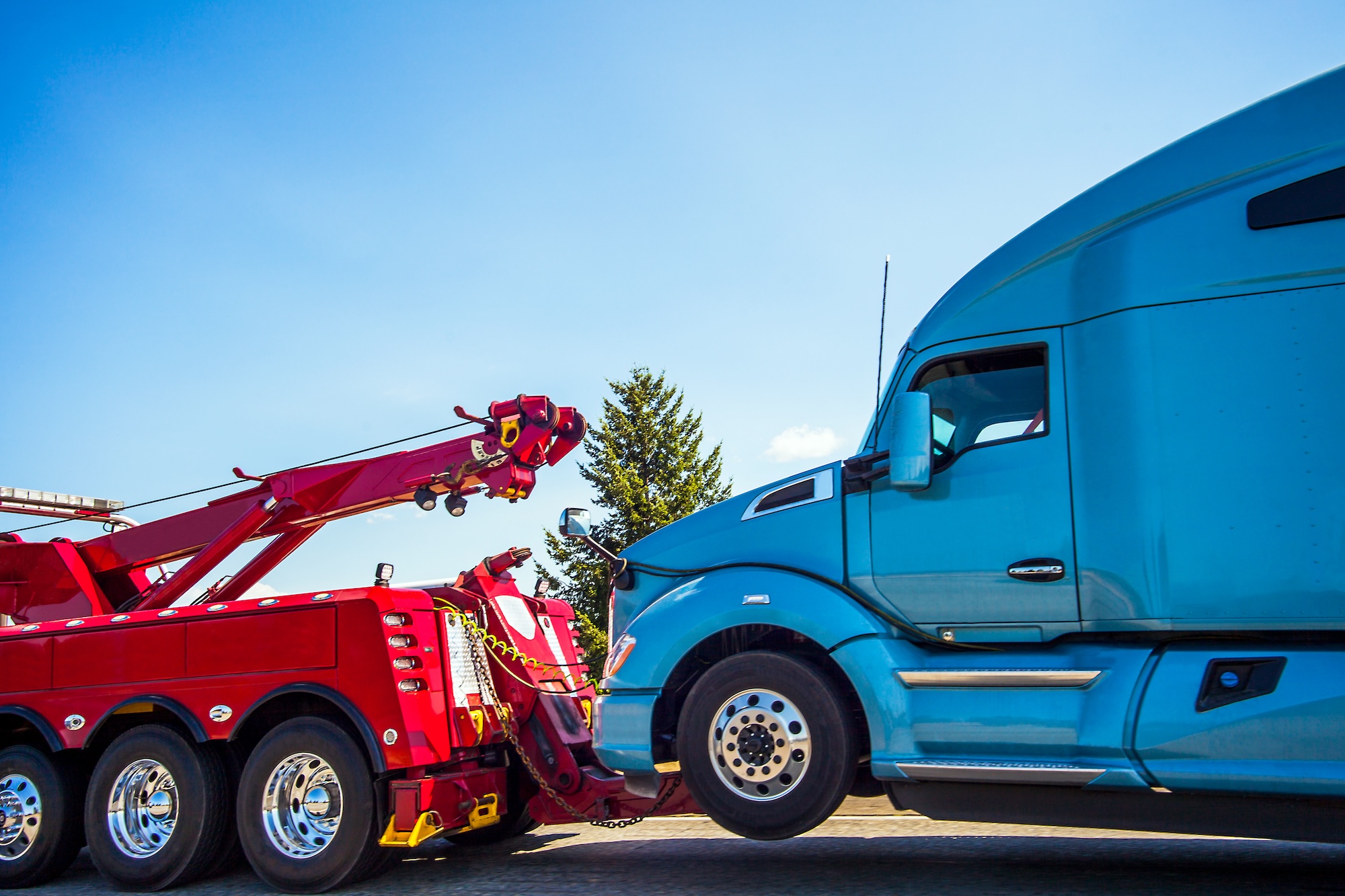 Tow truck with semi hooked up